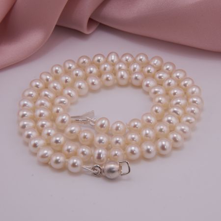 Echte Perlenkette, oval weiss